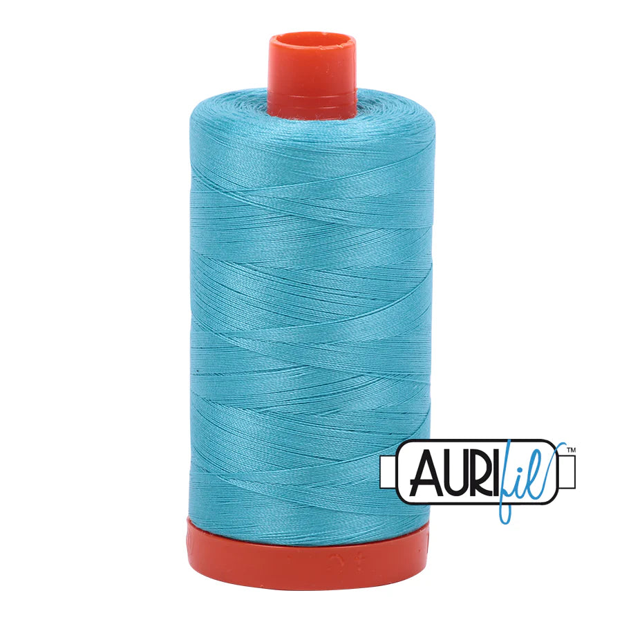 Large Spool 50wt: 5005 Bright Turquoise. 1422 yds.
100% Long Staple Mercerized Egyptian Cotton. For Machine Embroidery, Quilting and Serging.
