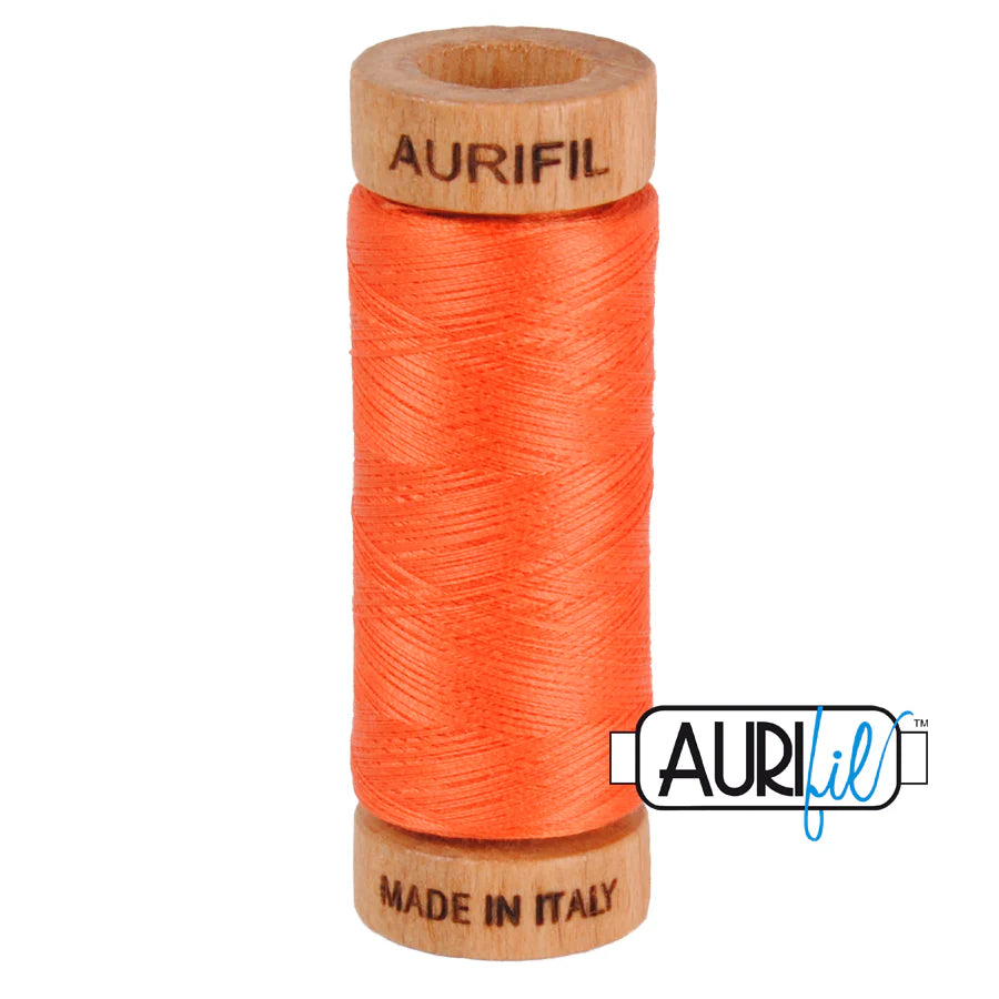 1 small spool 80wt: 1154 Dusty Orange. 220 yds.