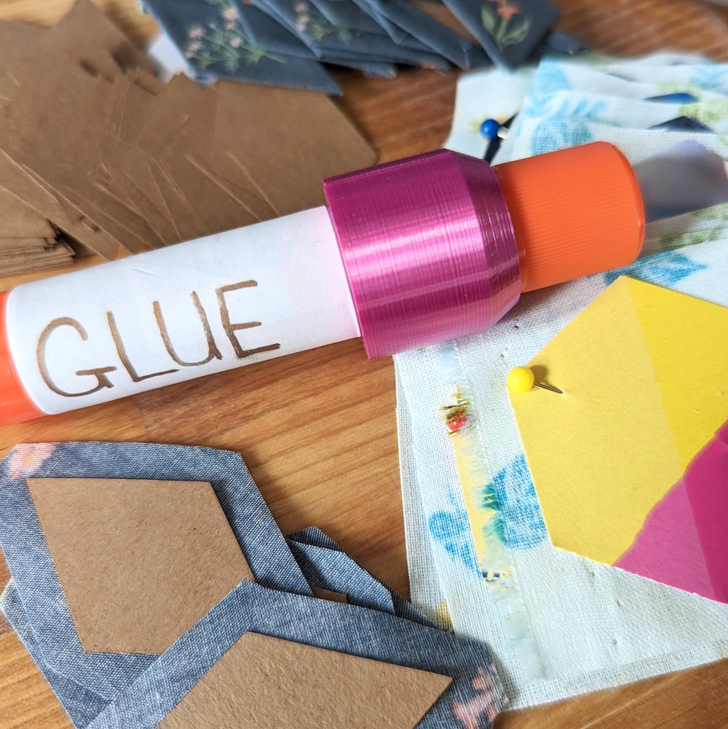 This reusable cap fits on a standard 6g washable craft glue stick. The soft glue is squeezed and shaped through the tip to a fine point, perfect for all your precision gluing jobs. Perfect for: English Paper Piecing, Foundation Paper Piecing, binding, and curves. When you're done, just pop the original cap right on the end for an airtight seal! Finished a glue stick and ready for a fresh one? Not a problem! Just pop the Glue Stick Precision Tip off the old stick and onto the new one!