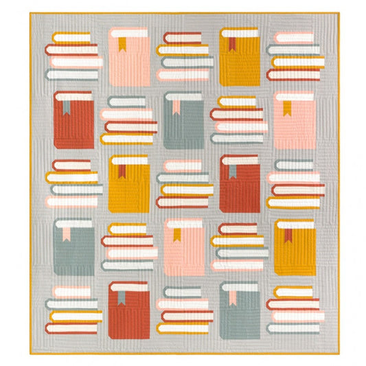 Book Nook is a traditionally pieced quilt that measures 64 1/2" x 70 1/2".  The pattern also includes a bonus "Open Book" block pattern. The "Open Book" block finishes 9 1/2" x 7" and is great for quilt labels, tote bags, pillows, & more! The 20-page pattern includes tags for organizing your cuts of fabric, a downloadable coloring page, thorough instructions, and colorful, detailed diagrams! Fat Quarter Friendly