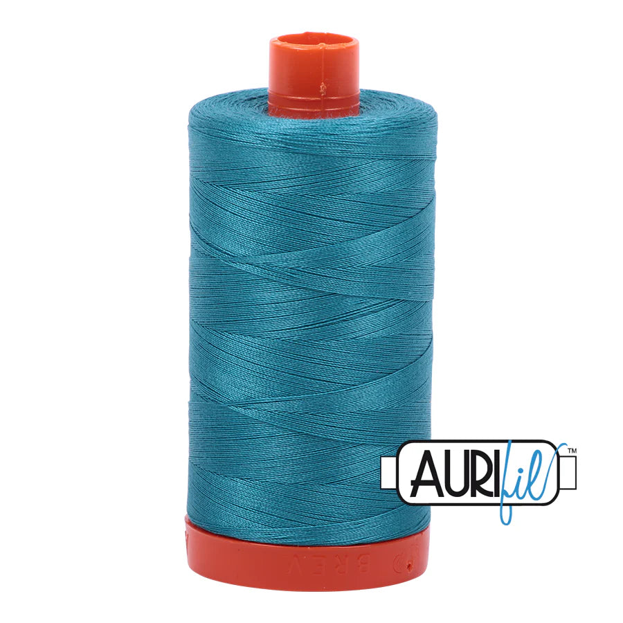 Large Spool 50wt: 4182 Dark Turquoise. 1422 yds.

100% Long Staple Mercerized Egyptian Cotton. For Machine Embroidery, Quilting and Serging.