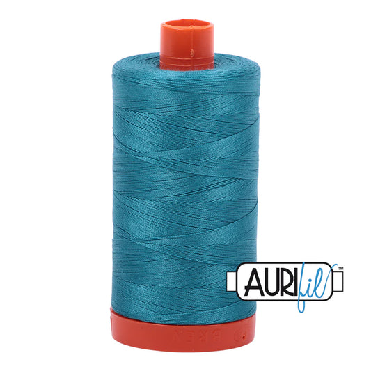 Large Spool 50wt: 4182 Dark Turquoise. 1422 yds.

100% Long Staple Mercerized Egyptian Cotton. For Machine Embroidery, Quilting and Serging.