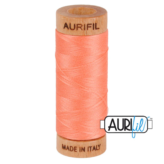 1 small spool 80wt: 2220 Light Salmon. 220 yds.