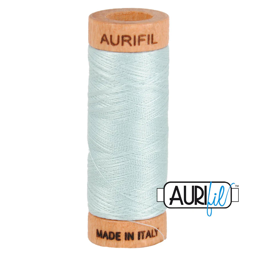 1 small spool 80wt: 5007 Light Grey Blue. 220 yds.

