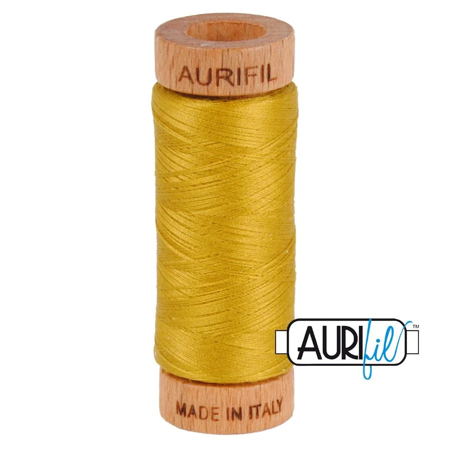 1 small spool 80wt: 5022 Mustard. 220 yds.
