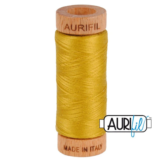 1 small spool 80wt: 5022 Mustard. 220 yds.