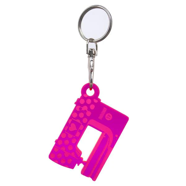 Sewing Machine Keychain by Tula Pink. Comes complete with the hardware needed to attach to your keys.