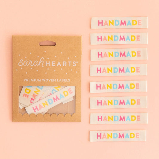 The perfect label for just about any and every handmade project! The cream colored labels have candy colored letters and are super soft to the touch. The labels are fully washable and can handle the heat of the dryer and coordinate perfectly with the entire Sarah Hearts fabric collection.