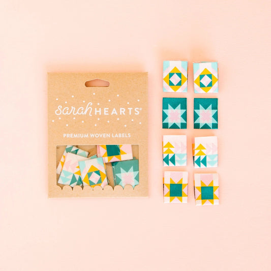 Classic quilt blocks for all your favorite quilted projects! These double-sided labels all feature a beautiful blush pink, cream, evergreen, and sage color palette. They are super soft to the touch, never scratchy, and fully machine washable.