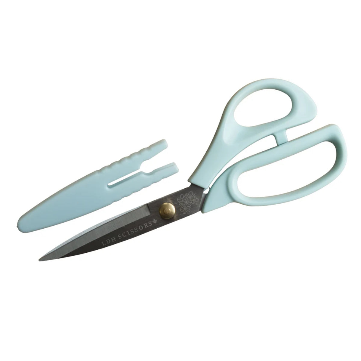 Introducing our latest collection: the Bloom Series. Designed to be both versatile and heavy-duty, these fabric scissors are ideal for a wide range of everyday projects. They feature a blunted tip for added safety, include a protective cap for secure storage, and are crafted with handles made from recycled plastic. Each pair is finished with a unique flower engraving and is a reflection of one of our values, both as a business and as individuals.