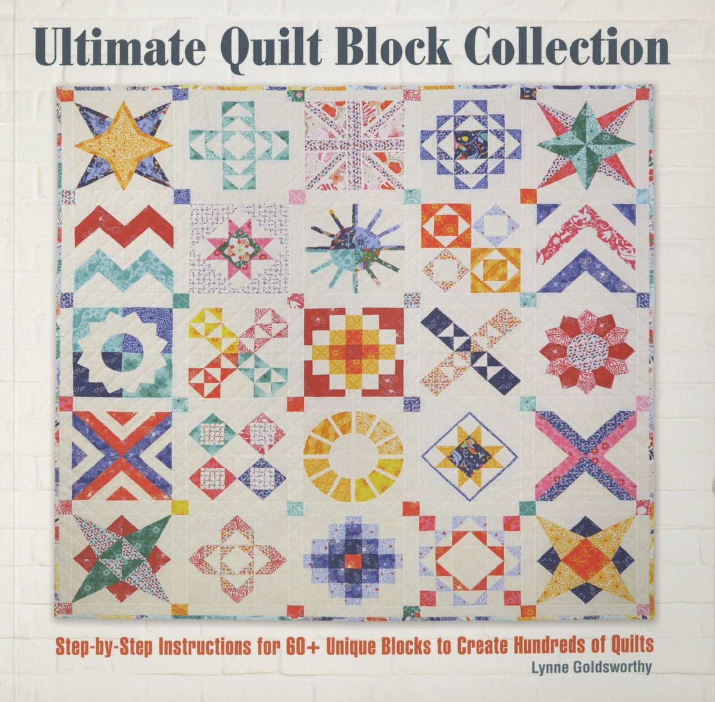 Ultimate Quilt Block Collection is a must have resource for quilters, featuring more than 70 original blocks from world renowned designers. From basic units like Flying Geese to more intricate motifs using foundation paper piecing, there's something here for every level of quilter. Mix and match classic and modern designs to make thunders of combinations. Lynn offers clear step by step instructions for every block with beautiful photos of every project. 