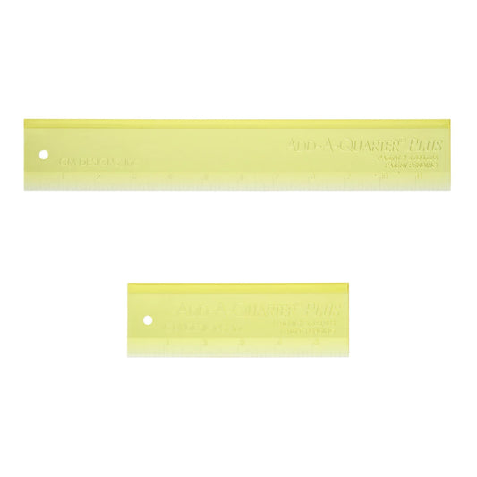 The specially designed lip on this ruler automatically allows 1/4 inch seam allowance to any angle for your rotary cutter.

Features Include:
Tapered edge to fold back foundation
Wider for easier handling
Use one tool for straight edge and for trimming 1/4" seam allowance.
Paper piece faster with less motion.

Included: Two Rulers - 6in and 12in