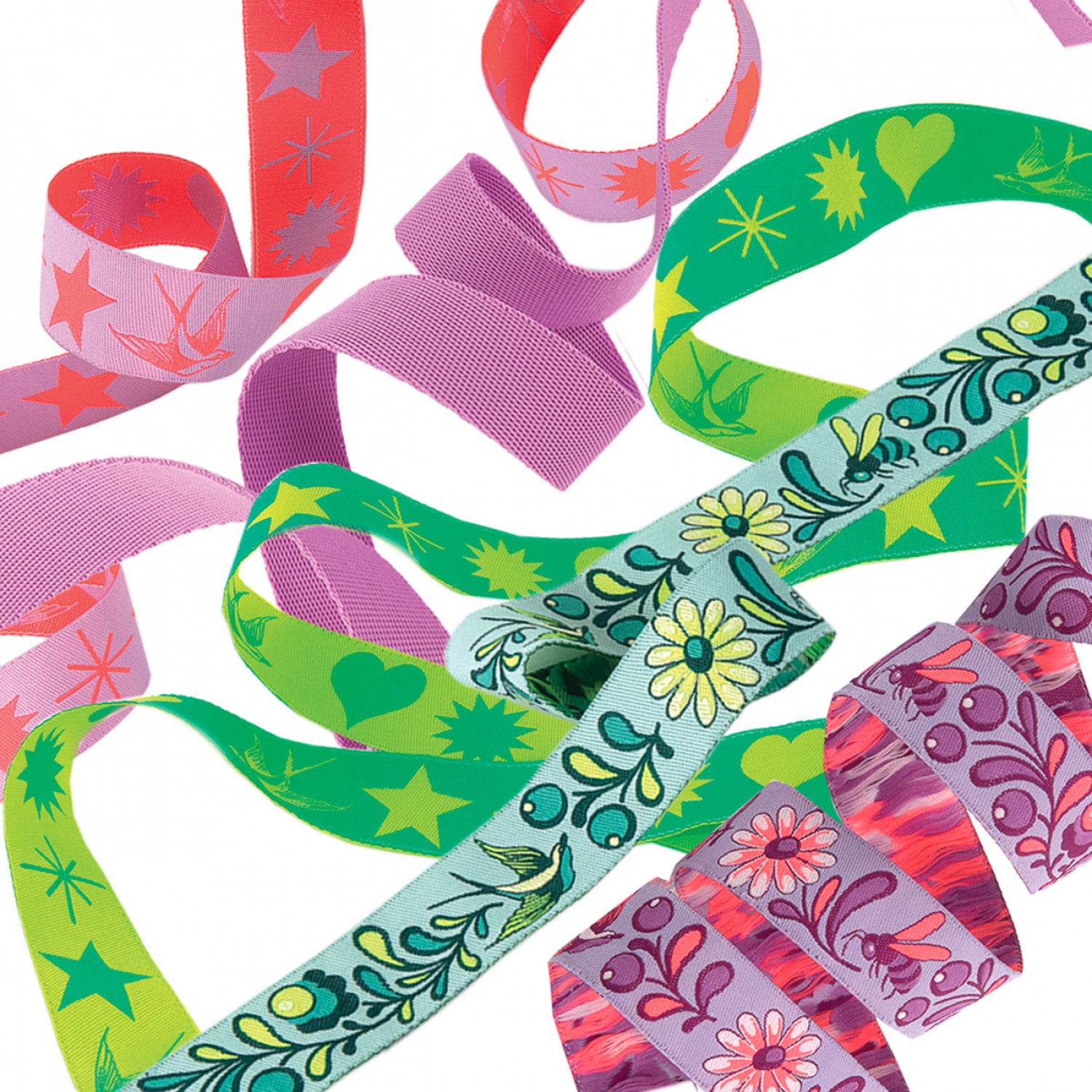 Brand new from Tula Pink, we want to introduce the newest Designer Pack - Fairy Flakes in Mystic! This pack includes 5 coordinated EverGlow webbing and ribbon prints - 2 yard ribbon cuts and 1 yard of webbing - to create a perfectly coordinated set!  