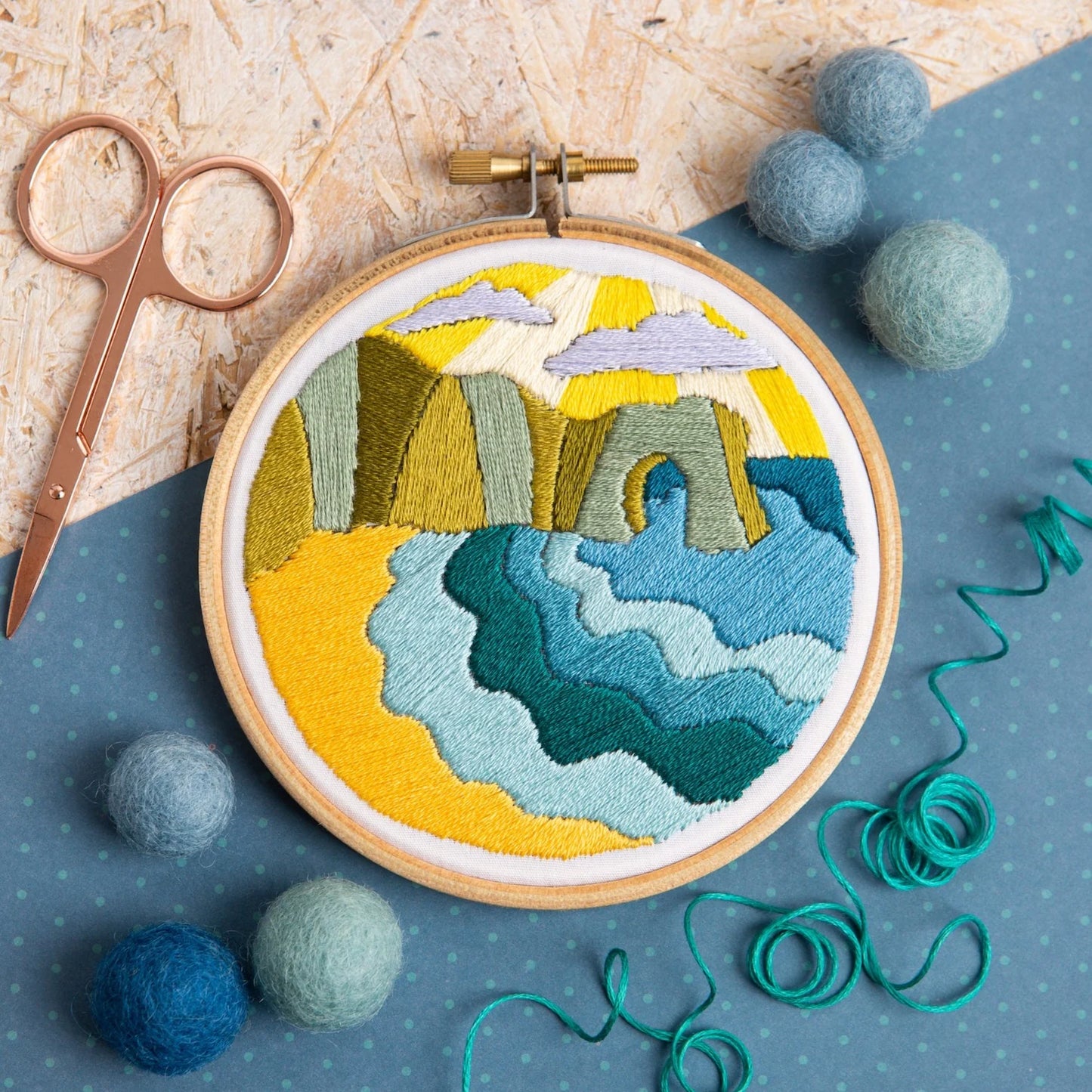 Embark on a stitch-sational journey with this mini embroidery kit, where the iconic Durdle Door of Dorset comes to life under your fingertips!  With luscious satin stitches that paint the dramatic cliffs, majestic skies, and the tranquil sea, this kit is your ticket to a crafting escape. No matter if you're a newbie to the needle or an embroidery enthusiast, you'll find joy and relaxation as you craft your own version of this natural wonder.