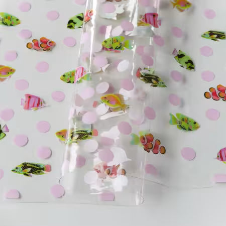 Bring a splash of underwater magic to your sewing projects with Tula Pink’s Floral Reef Collection. Each design is printed on durable, easy-to-clean TPU vinyl that’s perfect for bags, accessories, and home décor.

School Crossing : A lively design with schools of colorful fish swimming in harmony.


Size: 25" width and .45mm thick