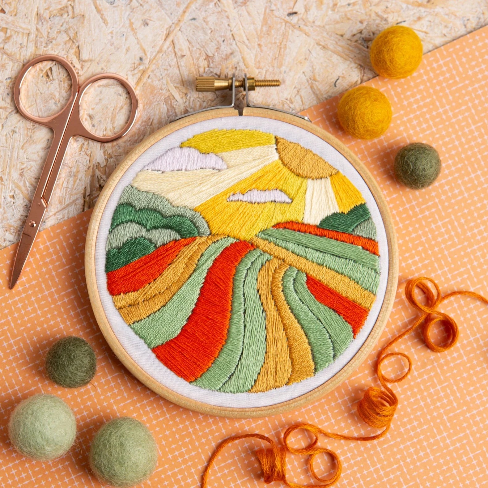 Head off on a cozy, creative adventure with the Harvest Time Mini Embroidery Kit! As the season turns, watch as your own tapestry of autumn's bounty unfolds beneath your hands. With every stitch, you'll weave a rich landscape of harvest golds, fiery oranges, and deep forest greens, bringing to life a scene as heartwarming as a pumpkin spice latte.