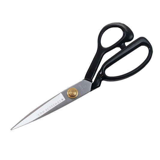 Our Traditional Fabric Shears were one of our first products when LDH Scissors was founded in 1990. They are crafted from carbon steel and hollow-ground to ensure precise cuts.

Our Traditional Fabric Shears are crafted from industrial-grade carbon steel, the same material and process used to make our Midnight Edition Fabric Shears.

The classic shape of our handles are rubber coated to provide more padding to protect your hands.

They can cut through multiple layers of fabric, leather, fleece, vinyl, denim