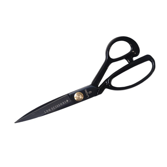 Forged from carbon steel, and now enhanced with manganese, our Midnight Edition Fabric Shears are an industrial-grade, professional tool crafted by our scissor-masters. They’re our best-selling fabric shears!

The blades are slightly concave and perfectly aligned to allow them to cut through thick layers effortlessly.&nbsp; Our most popular fabric shears, they're loved by sewists, quilters, fiber artists, and crafters of all kinds!