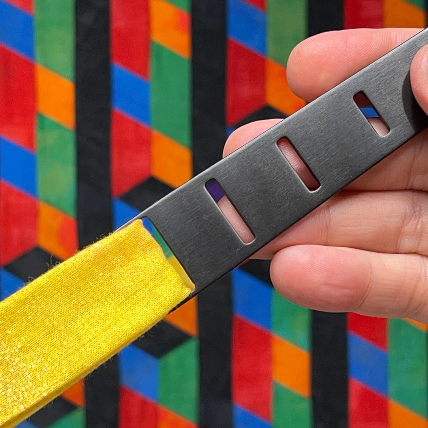 Stainless steel fabric weaving tool set designed by Mx Domestic. Includes one 1” and one 1/2” tool for fabric weaving, elastic threading, and mixed media use. Features top-loading slot system for easy grip and precision control. Set includes 2 tools with QR code for video tutorial and project inspiration.