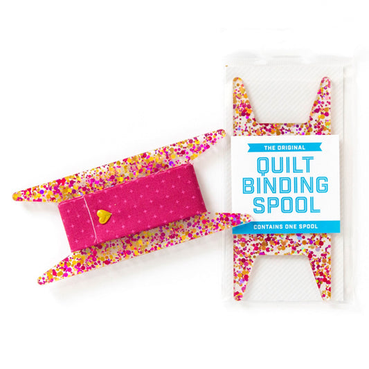 Lets get organized! Keep your prepared binding nice and tidy on our new Quilt Binding Spools. Each spool will hold enough for a whole quilt -- whatever size you make! Or a great way to store extra bindings to keep them neat and tidy.  Included: 1 Spool Size: 5-3/4in x 2-1/2in