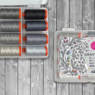 Tula Pink’s Graywork is a bold exploration of neutrals— an artful follow-up to her 2020 Lifework collection. Featuring detailed illustrations of animals like wolves, puffins, and snow leopards, and supported by versatile coordinating prints, Graywork was designed to fill the quiet spaces between the rainbows. To complement this striking collection, we’re thrilled to introduce two coordinating thread sets in Tula’s go-to Cotton 50wt—now featuring neutral hues for the first time ever. 