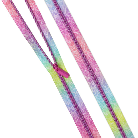 Make a splash in your next sewing project with Making Waves #5 Zippers. This design ripples with ocean-inspired artwork and a playful Tula twist—complete with pink zipper teeth for that unmistakable pop. Durable, flexible, and ideal for bag-making and accessories. Includes 3 yards of zipper tape and 9 coordinating pulls so you're ready to ride the wave of creativity.