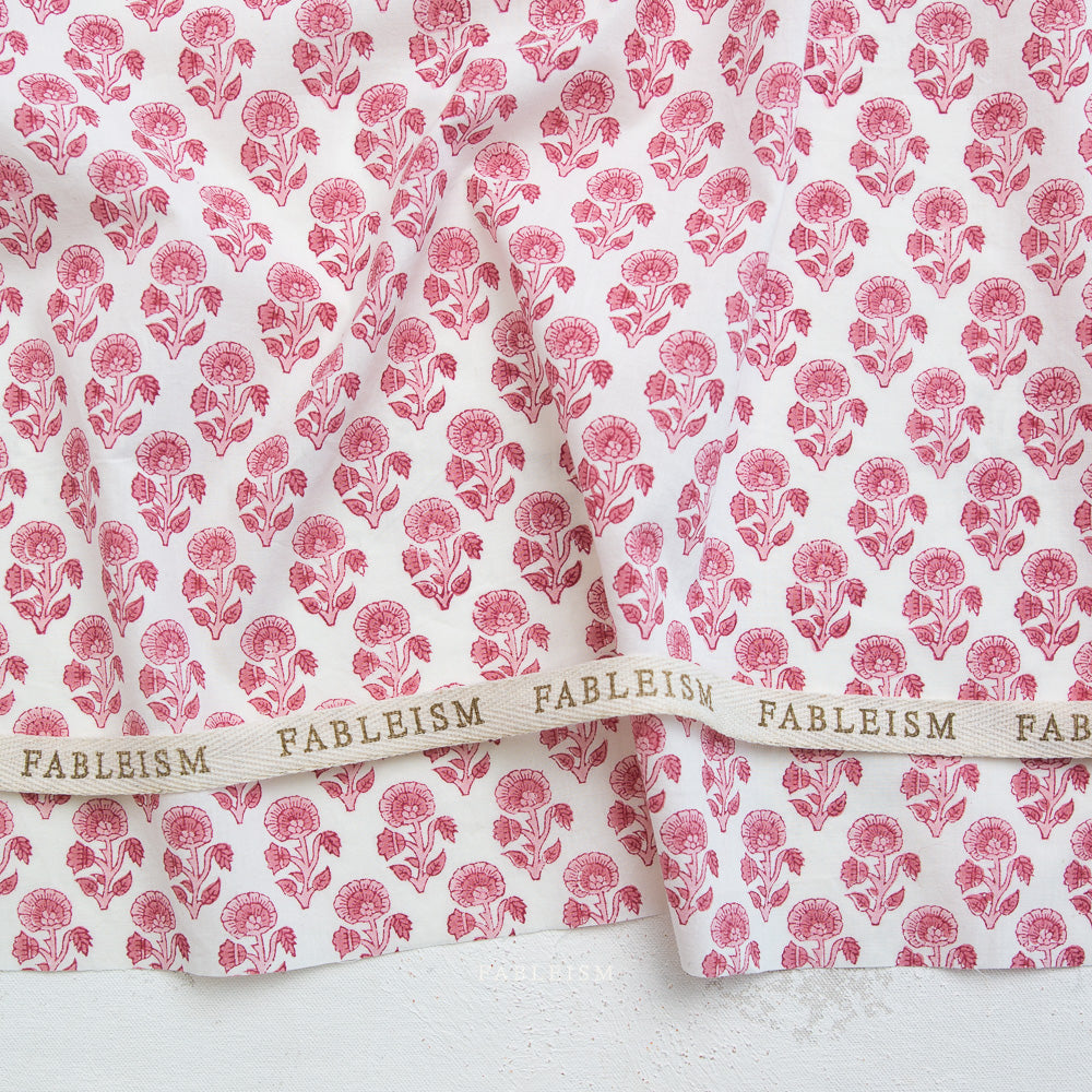 Manufacturer: Fableism
Designer: Fableism
Collection: Indian Block Prints: Cottage
Print Name: Stamp Floral in Pink
Material: 100% Cotton
Weight: Quilting 
SKU: BPCT-03-SPF-PINK
Width: 44 inches