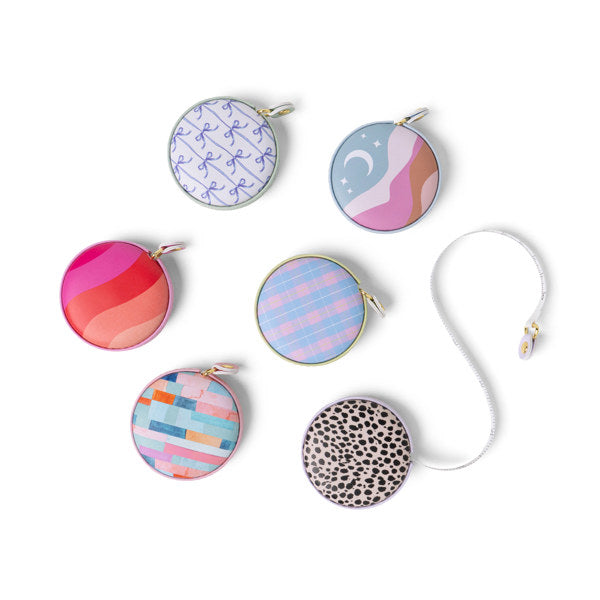 The handiest thing you'll own that you never knew you needed! Perfect for crafting, creative hobbies, measuring furniture, trying on clothes and more, this mini tape measure is easy to use and ultra flexible so you can measure any shape with accuracy.

Quick Features:

Flexible tape with standard &amp; metric markings
Extends to 5 feet
Push-button retraction
Pocket sized