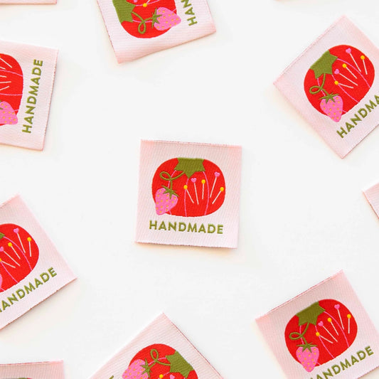 Add some charm to your sewing projects with this vintage tomato pin cushion! These handmade woven labels add a unique touch to quilts, garments, and bags. Plus, they're easy to sew on with an end fold design. Get ready to add some vintage flair to your creations!

Sold in packs of 4 labels

Size: 4.5cm x 4.5cm, endfold

100% polyester manufactured ethically in China and are OEKO-TEX Standard 100 certified