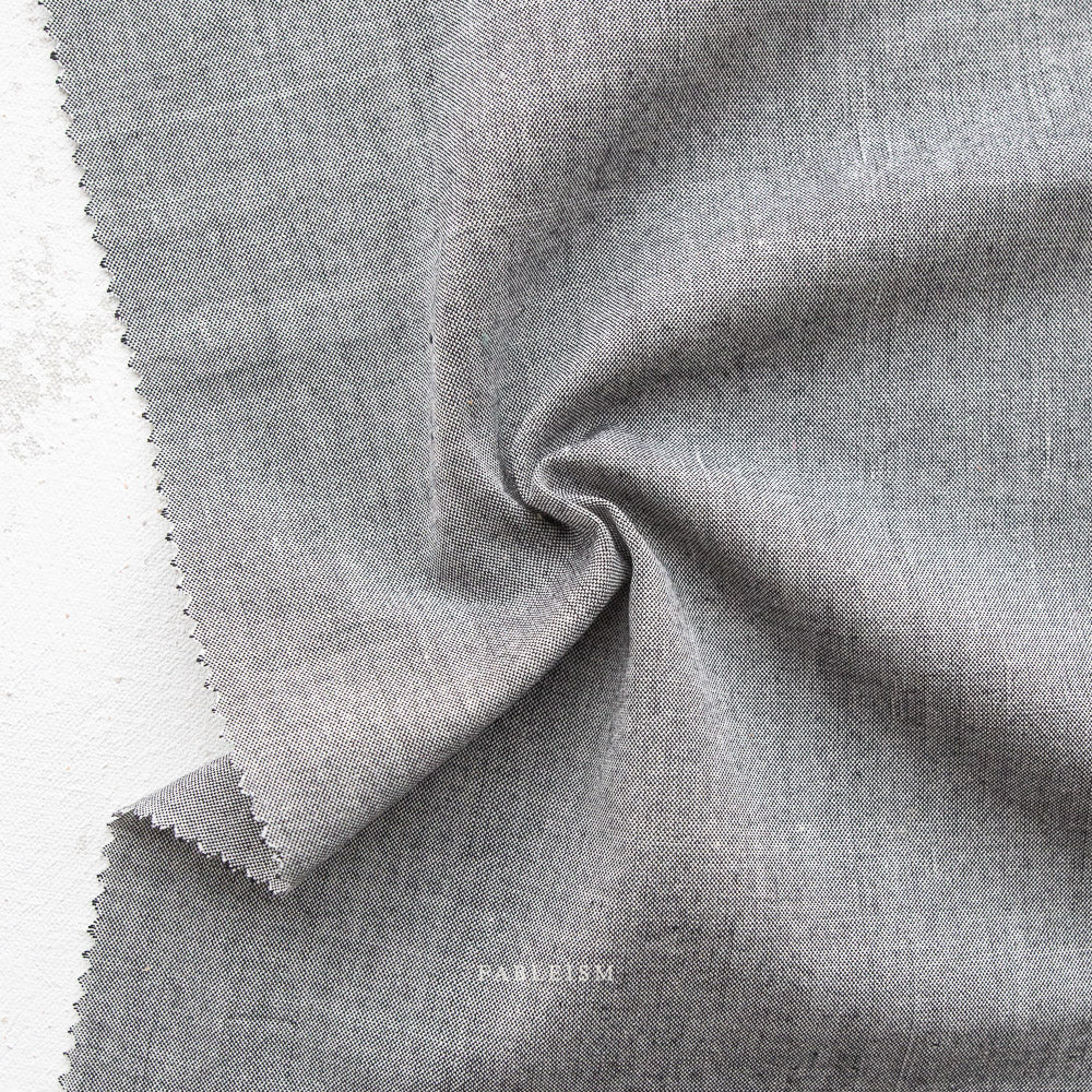 Manufacturer: Fableism Supply Co. Designer: Fableism Supply Co. Collection: Everyday Chambray: Nocturne Print Name: Quicksilver Material: 52% Cotton/48% Bamboo SKU: ECW-NOC-01-QUICKSILVER Width: 44 inches