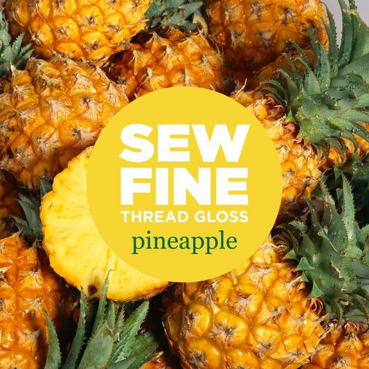 0.5oz pot of "Pineapple" Sew Fine Thread Gloss. A truly sweet and succulent fragrance, this pineapple thread gloss smells identical to freshly cut pineapple. No more tangled, knotted or static-y threads while you're hand-sewing!