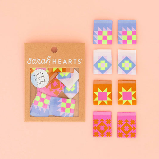 Then Came June X Sarah Hearts Collaboration

These bright and colorful labels were created in partnership with modern quilter Then Came June and are perfect for sewing into quilt bindings, apparel, and more. Each multipack contains 2 of each quilt block designs. These polyester woven labels are soft to the touch, fully washable, and can handle the heat of the dryer.

Sold in packs of 8 labels, 2 of each color way

Manufactured ethically in China and are OEKO-TEX Standard 100 certified