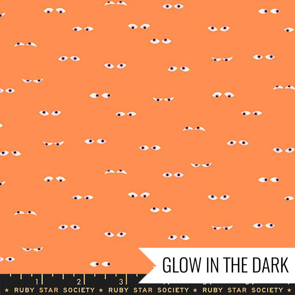 Manufacturer: Ruby Star Society Designer: Ruby Star Society Collection: Tiny Frights Print Name: Creepy Eyes in Pumpkin Glow in the Dark Material: 100% Cotton Weight: Quilting  SKU: RS5120 11G Width: 44 inches