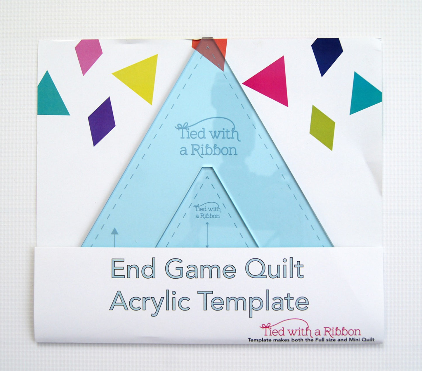This template set is is designed to be used with the Both the End Game and Love Triangle patterns from Tied With a Ribbon.  The 3in Template makes the Mini Quilt and the 8.5in template makes the large quilt in both patterns.