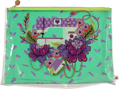 This Large Project Bag has a full-color printed back panel of Tula Pink's Pedal to the Metal design from her HOMEMADE Collection. The front panel is clear and zipper pull is engraved metal. Bag measures 18" x 13" with a 2" gusset.