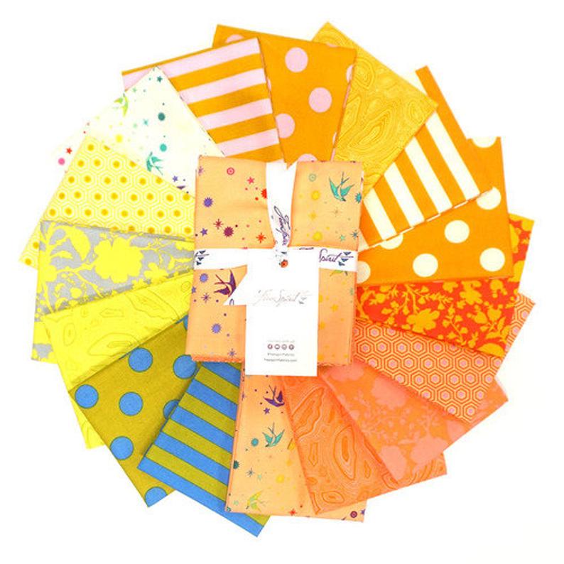 This Factory Cut FAT QUARTER bundle contains 16 quilting cotton prints from the Goldfish Colorway of True Colors by Tula Pink for Freespirit Fabrics.  Manufacturer: FreeSpirit Fabrics Designer: Tula Pink Collection: True Colors in Goldfish Colorway Material: 100% Cotton  Weight: Quilting