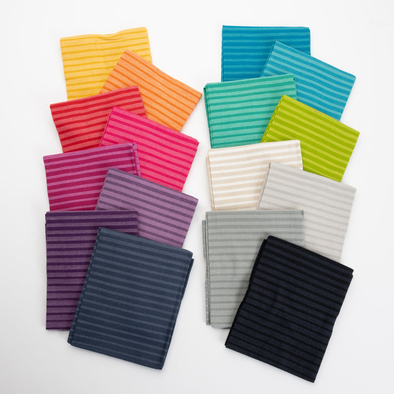 This factory cut FAT QUARTER BUNDLE contains 16 cotton woven prints from Ombre Wovens by V and Co. for Moda Fabrics.  Manufacturer: Moda Fabrics Designer: V and Co. Collection: Ombre Wovens Material: 100% Cotton  SKU: 10872AB Weight: Quilting